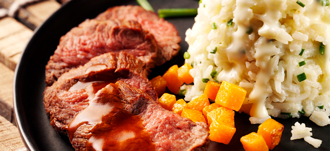 Risotto met roomzachte Goudse kaas, pompoen en biefstuk