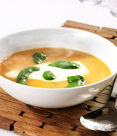 Potage au potiron, au fromage de chèvre et huile à la ciboulette