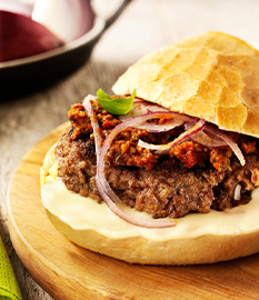 Beefburger with brie and mushroom tapenade