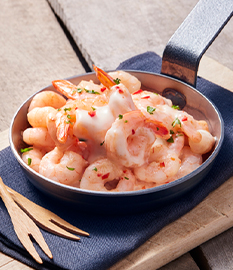 Garlic-chilli prawns in a goat’s cheese sauce