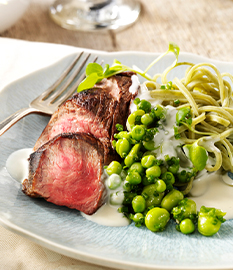 Tender beef steak with pasta verde and a goat’s cheese sauce