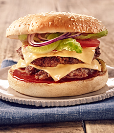 Double cheeseburger with cheddar cheese, tomato and lettuce