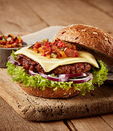 Vegetarian burger with organic cheese and ratatouille