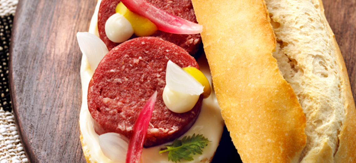 Beef sausage sandwich with brie