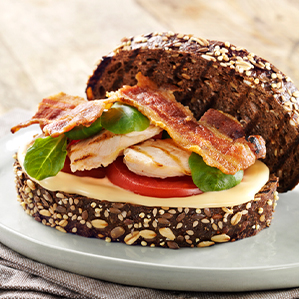 BLT Sandwich with grilled corn-fed chicken and melted aged cheese