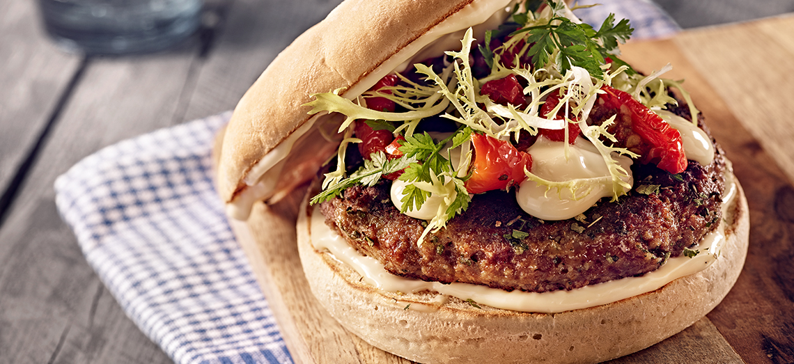 French burger with melted Roquefort