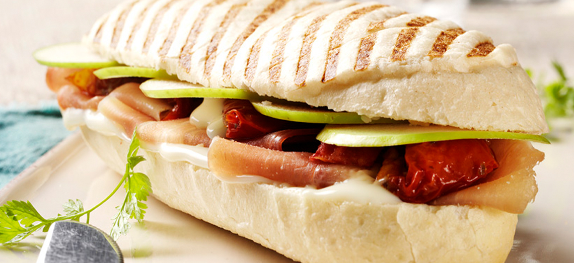 Panini with parma ham, pepper and extra aged cheese