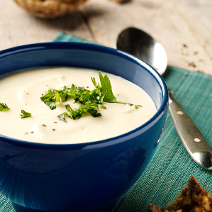 Soup from forgotten vegetables with extra aged cheese