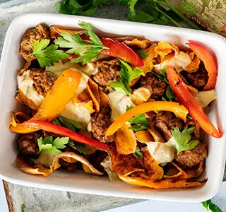 Privé: Zoete aardappel nacho’s met vegetarische balletjes, paprika, biologische kaas en bladpeterselie