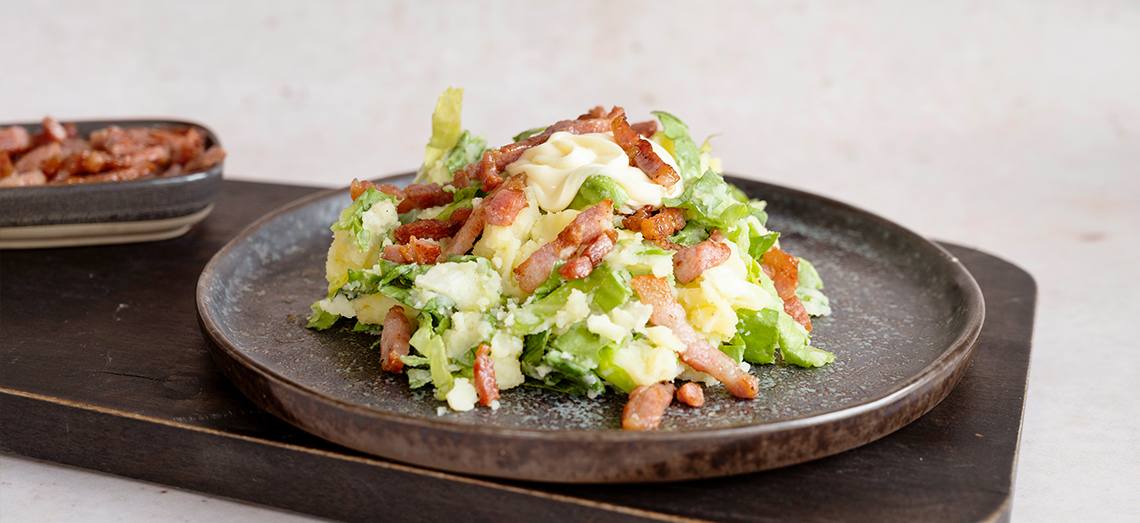 Andijviestamppot met spekjes en Goudse kaas