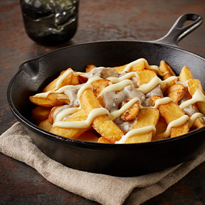 Friet met champignon ragout en Parmezaanse kaas